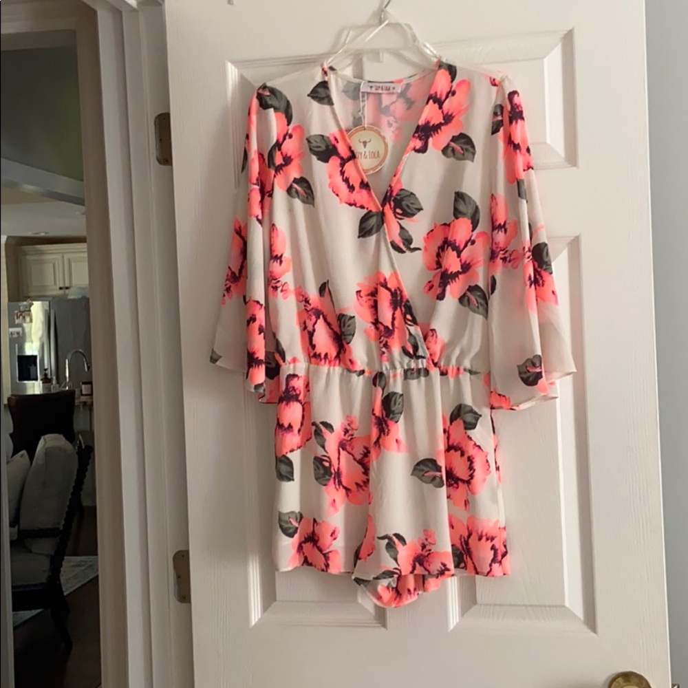 Neon and ivory floral flutter sleeve romper